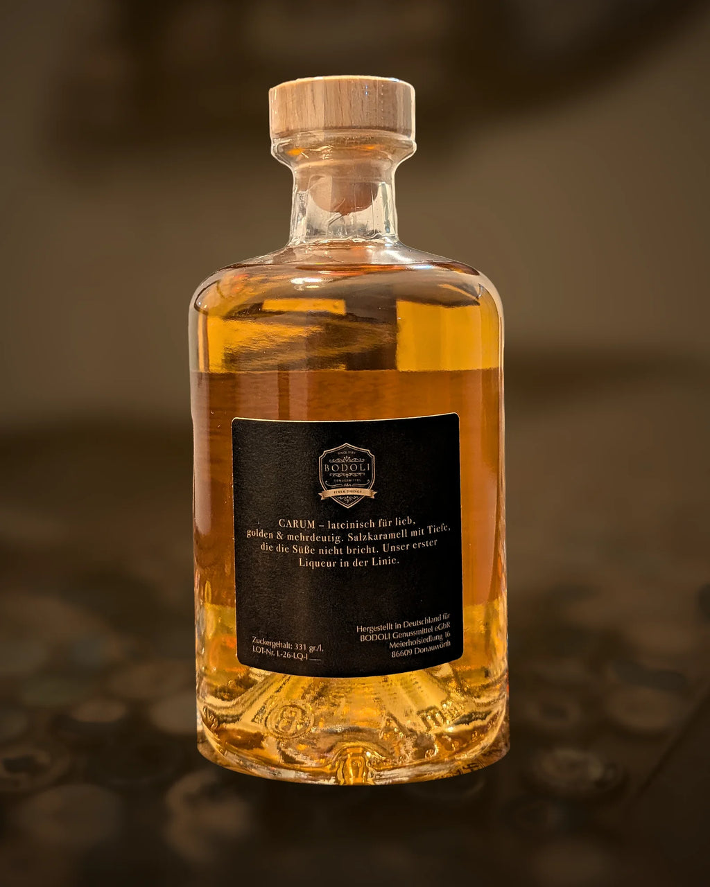 BODOLI CARUM Salzkaramell Liqueur – Rückseite mit Etikett
